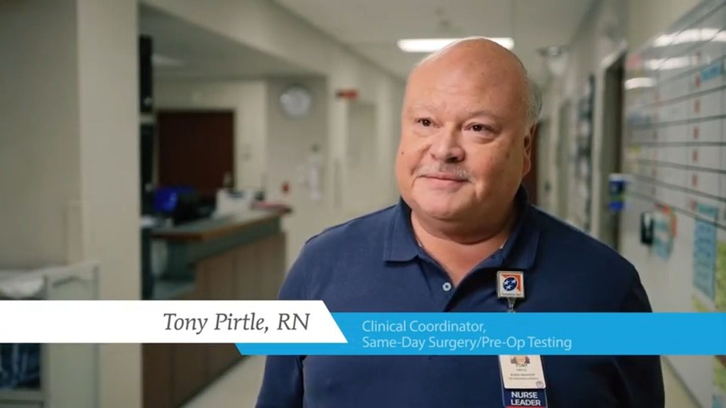 Tony Pirtle, RN, Clinical Coordinator for Same-Day Surgery and Pre-Op Testing, standing in a hallway at Skyline Medical Center.