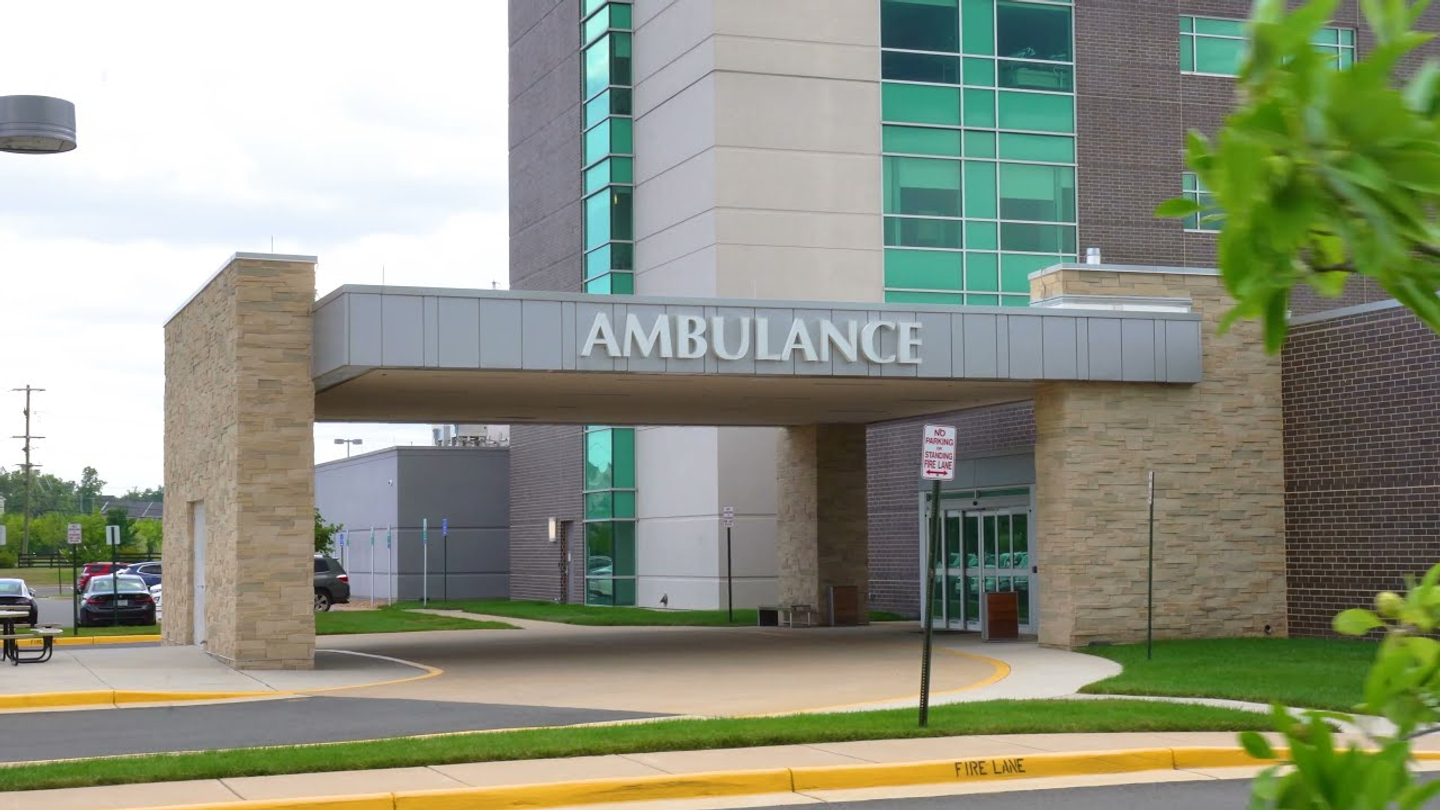 Exterior emergency entrance of StoneSprings Hospital Center.