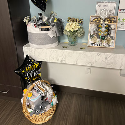 News years themed gifts, including gift baskets and flowers, that were given to the family of the first baby born in 2024 at Medical City Arlington Hospital.