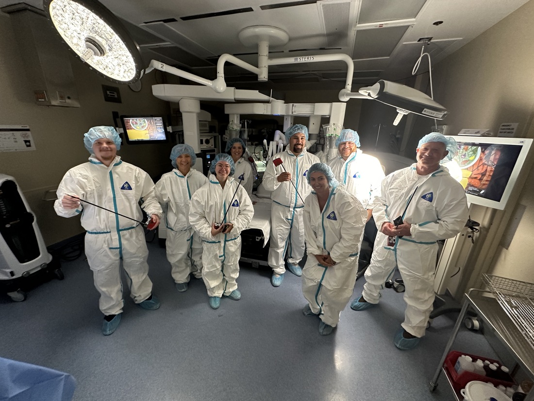 Caption 4: Leadership Englewood class members donned surgical grade PPE for an up close look at the robotic surgery unit at HCA Florida Englewood Hospital.