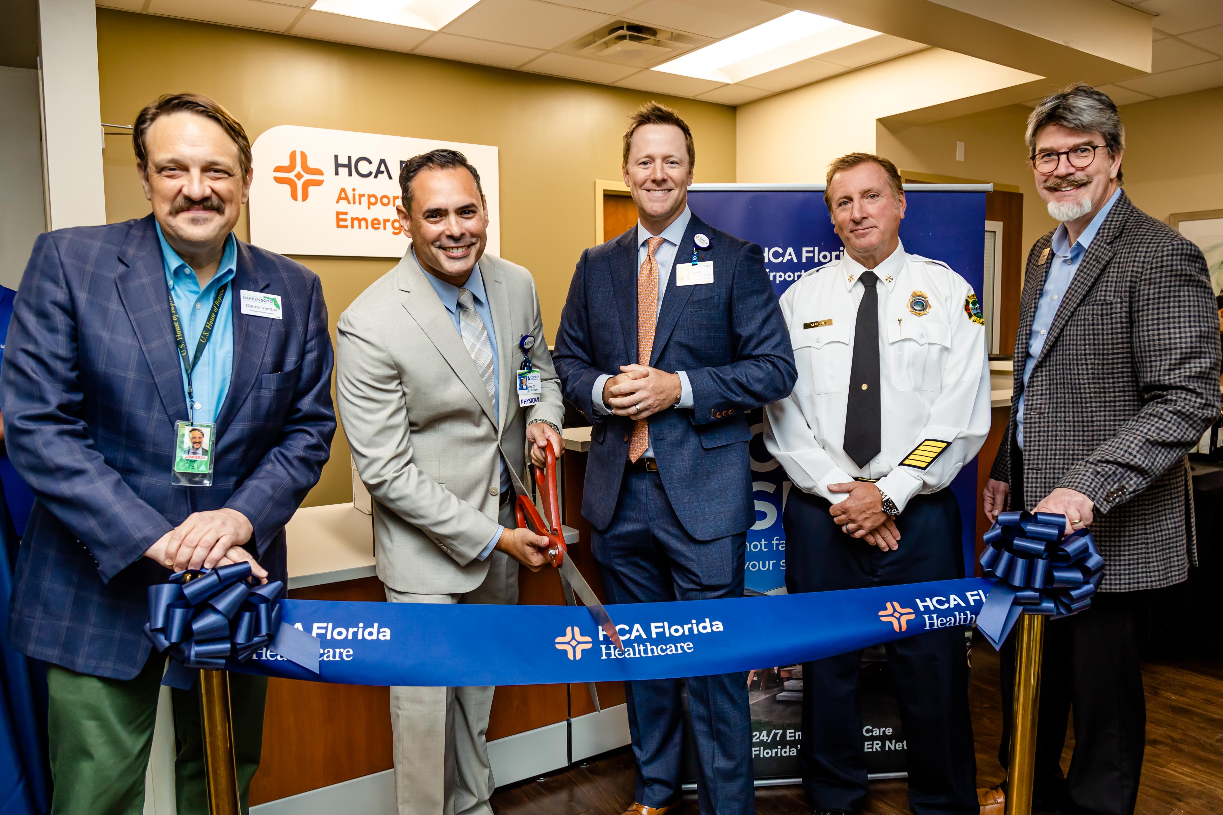 HCA Florida Osceola Hospital, EMS partners, and community leaders cut grand opening ribbon marking the official opening of HCA Florida Airport North Emergency.