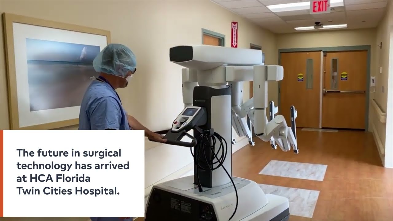 The future in surgical technology has arrived at HCAF Florida Twin Cities Hospital.  A technician wheels the DaVinci robot down a hall.