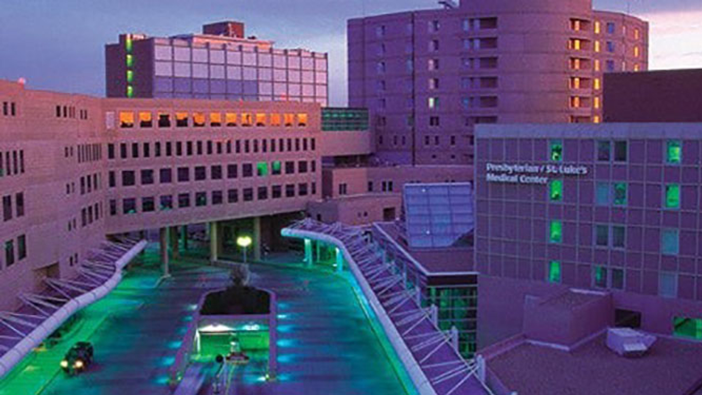 A vibrant neon colored rendering of the exterior view of Presbyterian St Luke's Medical Center.