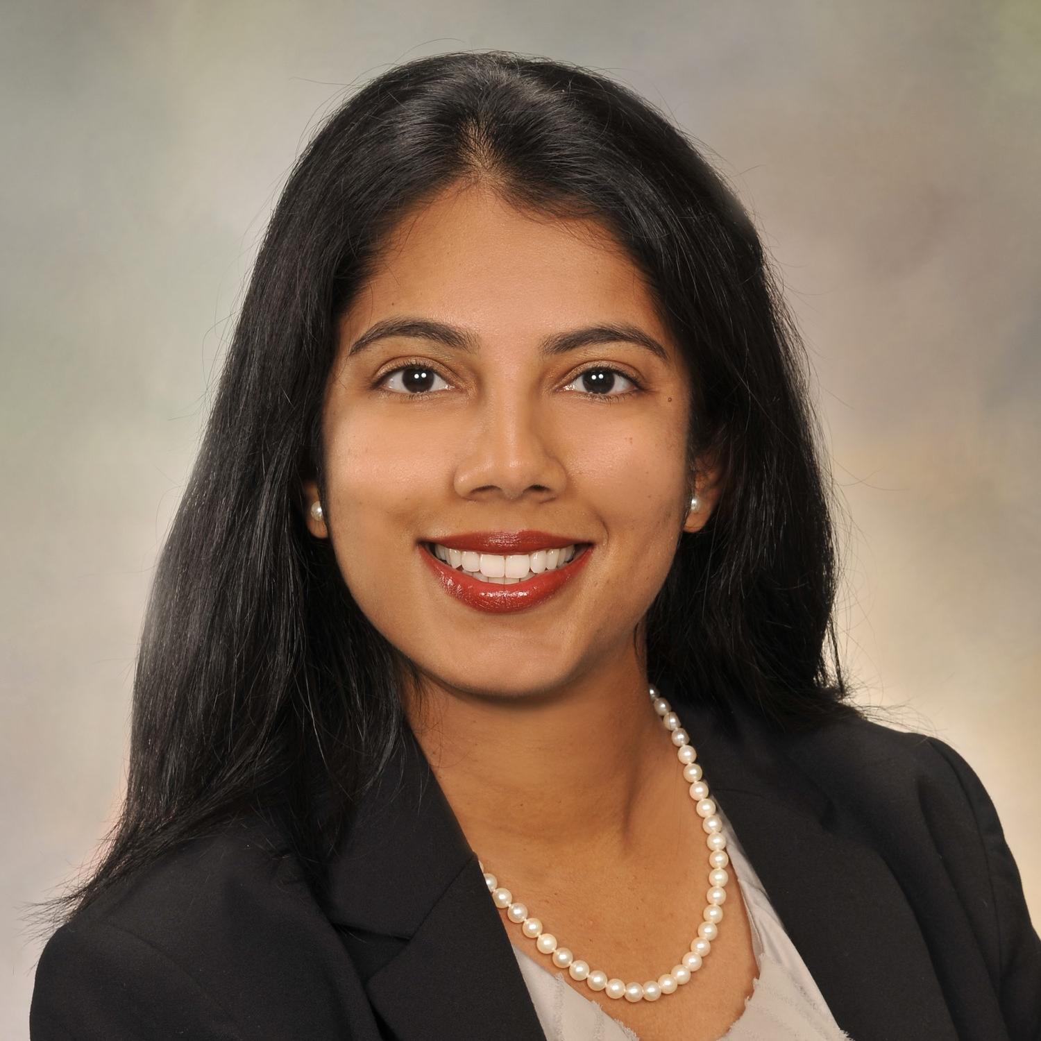 Dr. Anuja Mehta professional headshot.
