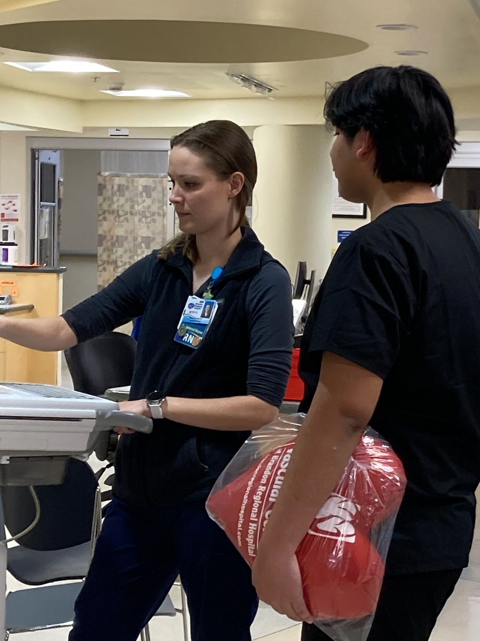 Rubicel Lopez, a local high school student learned about using an Eletrocardiogram (EKG) from registered nurse, Betsy Gant in the Cardiovascular Intensive Care Unit (CVICU) at HCA Florida Brandon Hospital.