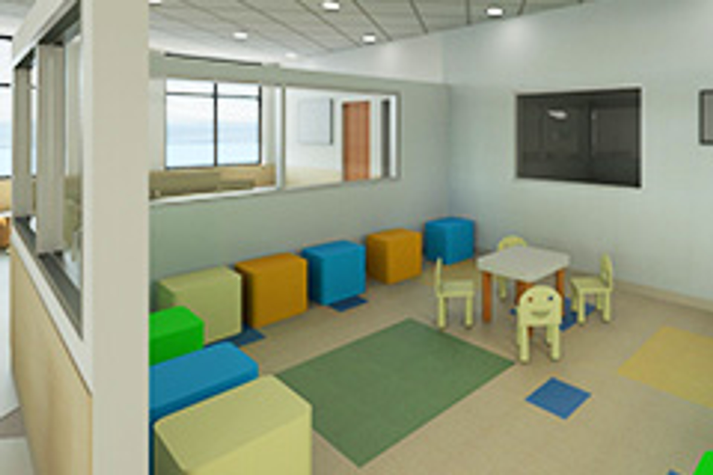 Interior of the Reston Hospital Center Emergency Room patient waiting area for children, with a small table and chairs and foam block chairs lined up against the walls of the room.