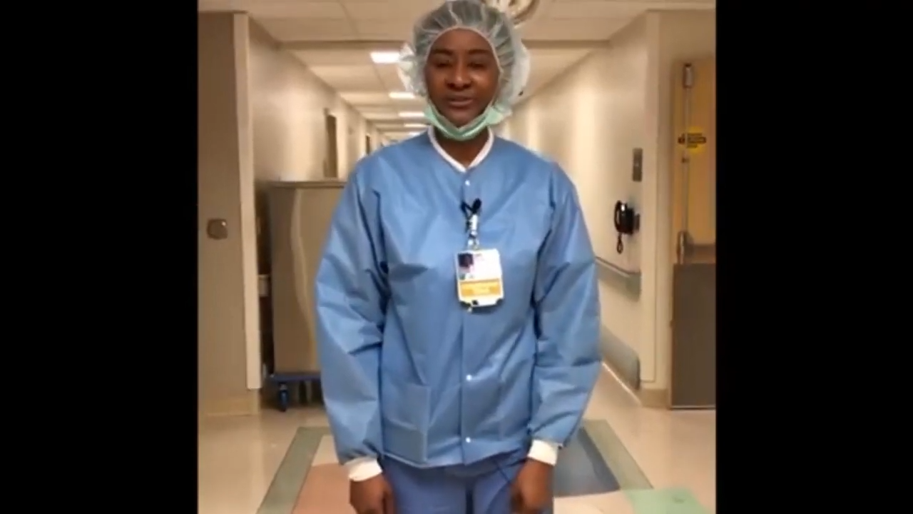 Surgical Services Director, Willie Williams, dressed in scrubs for surgery standing in the hospital hallway