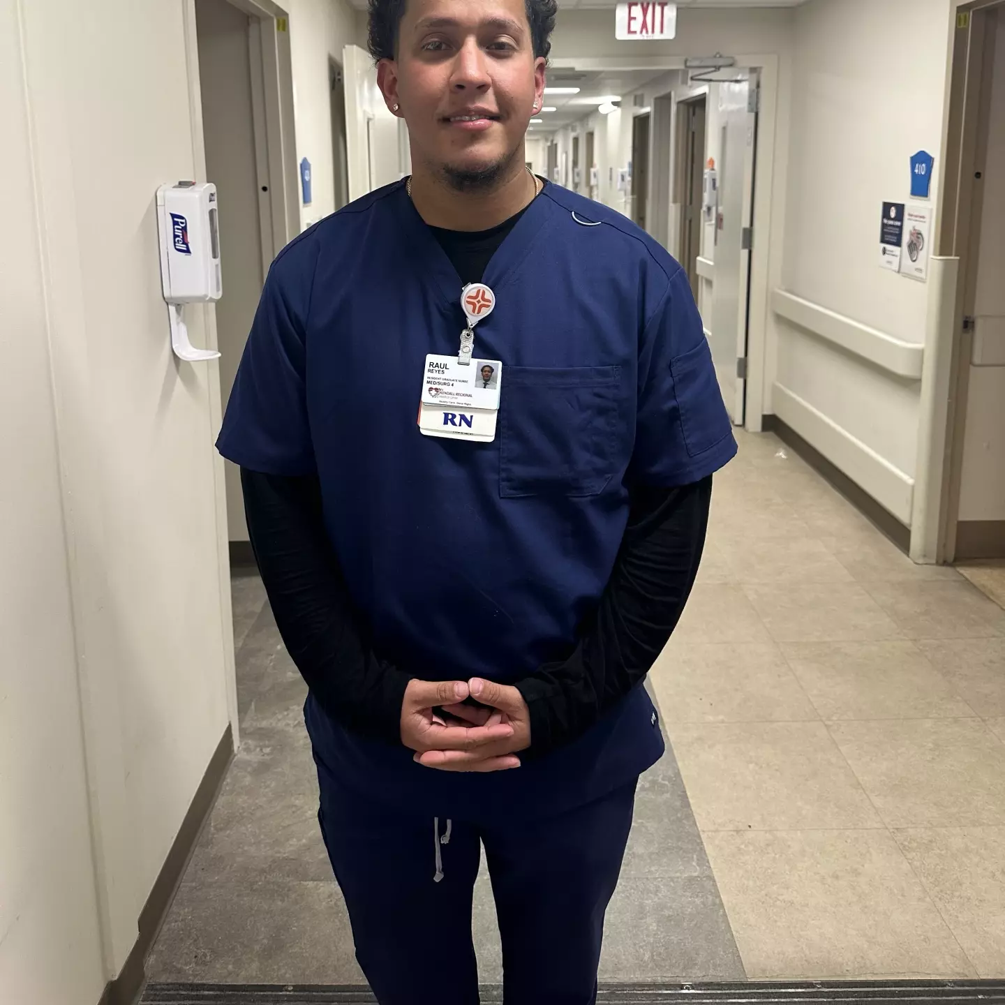 Raul Reyes in scrubs at the hospital.