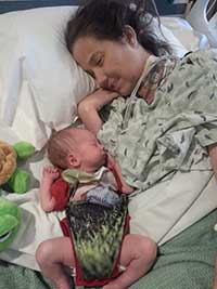 Molly with newborn baby Nolan shortly after his birth.