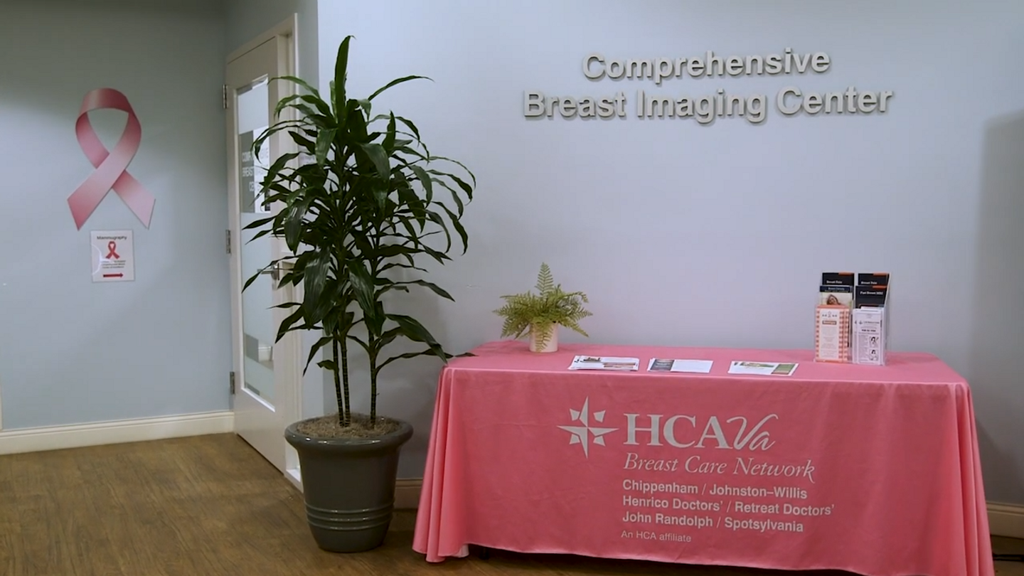 The Comprehensive Breast Imaging Center lobby at HCA Virginia with a table with a pink table cloth is displaying educational material on breast health.
