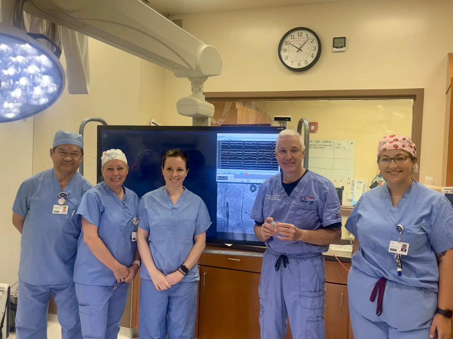 A group of doctors posing for the camera.