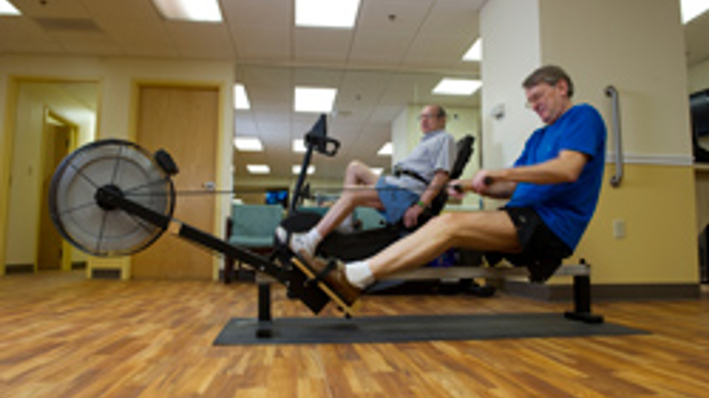 Patient of North Florida Hospital strength training during phase two of Cardiac Rehabilitation.