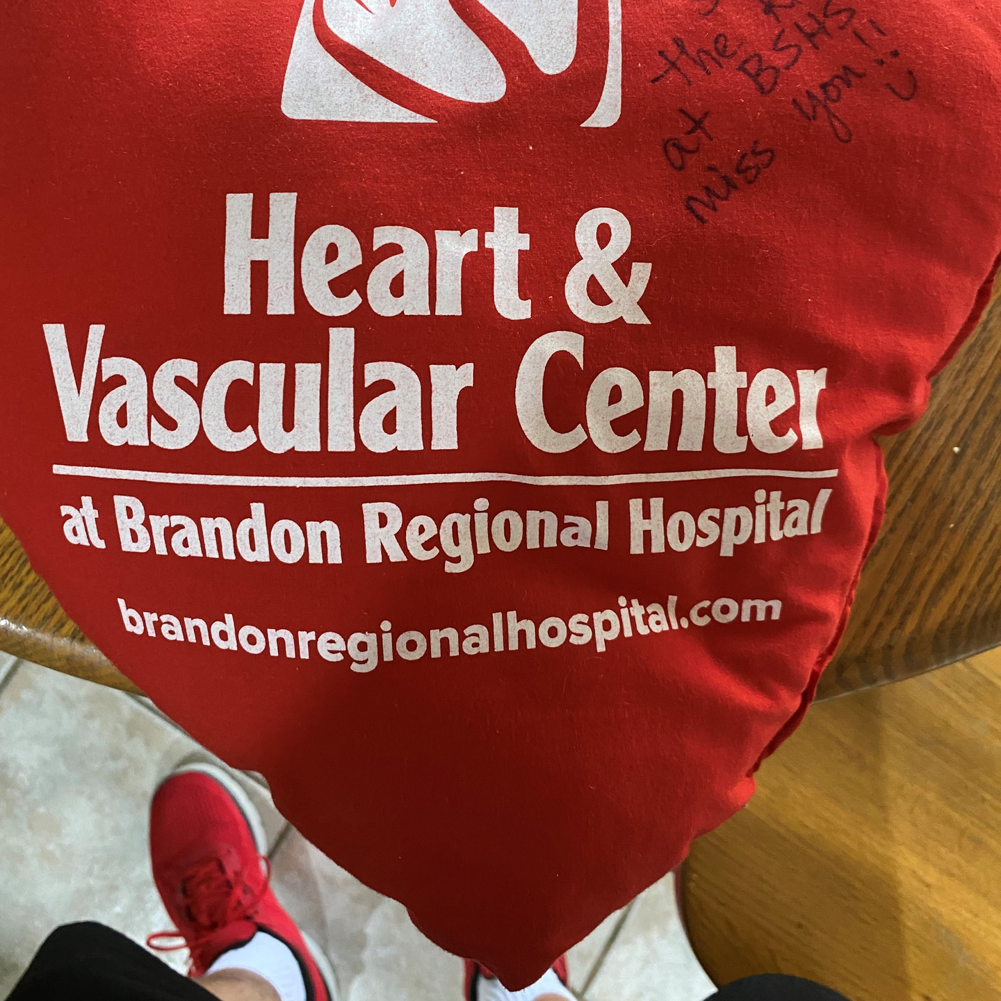Coach Tim received a heart pillow with a get well message after surgery.