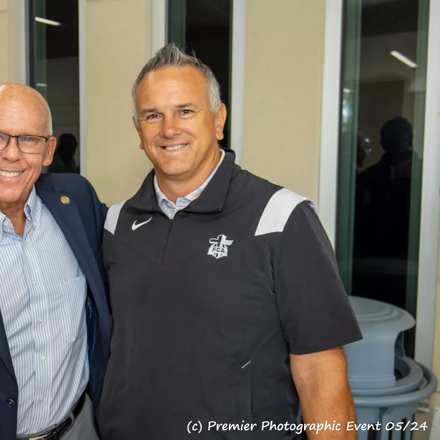 Two gentlemen attending the ribbon cutting ceremony.