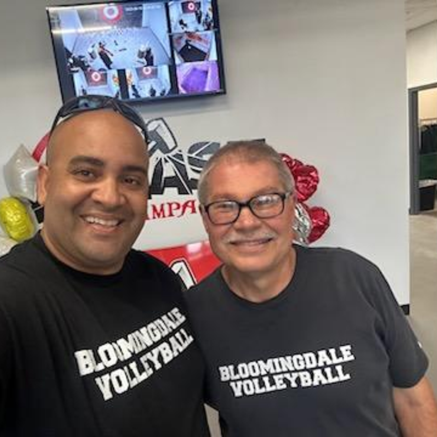 Head coach of Bloomingdale High School’s girls team, Damian Goderich and Coach Tim are in a photo.